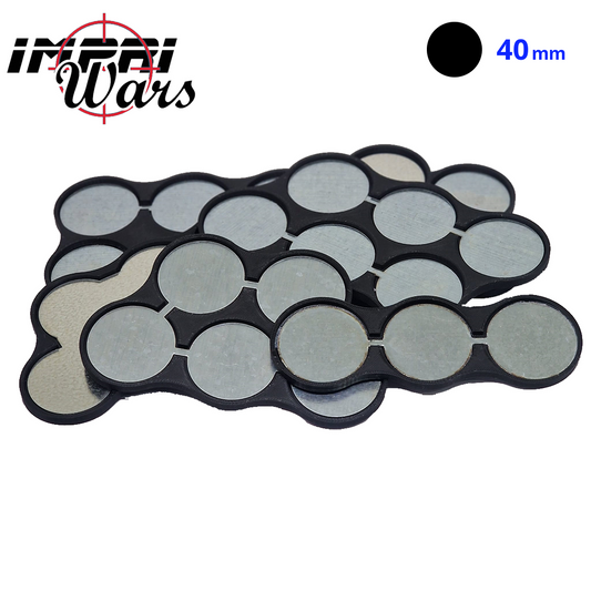 Bandejas imantadas negras para peanas redondas de 40 mm, superpuestas y con discos metálicos visibles.