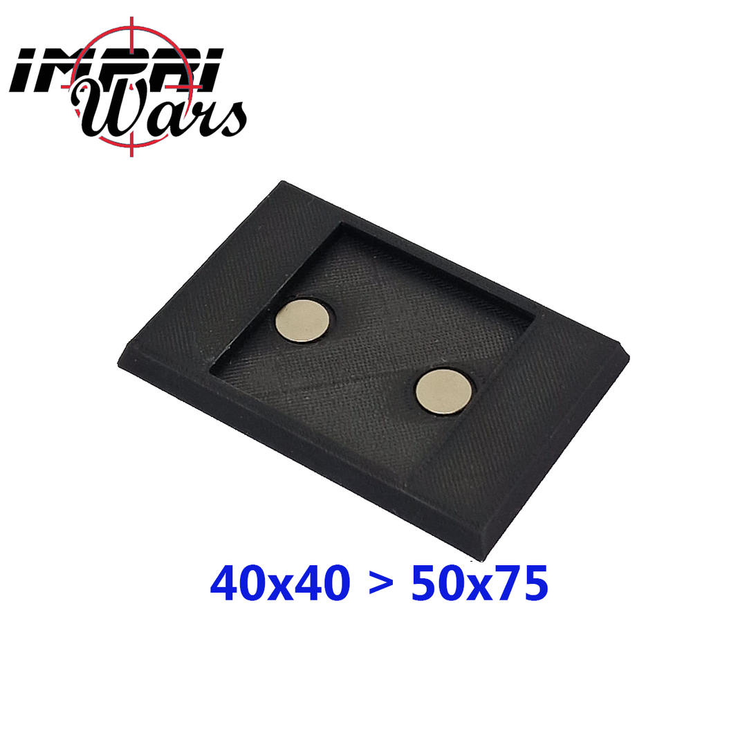Adaptador imantado negro de 40x40 a 50x75 mm con dos imanes visibles.