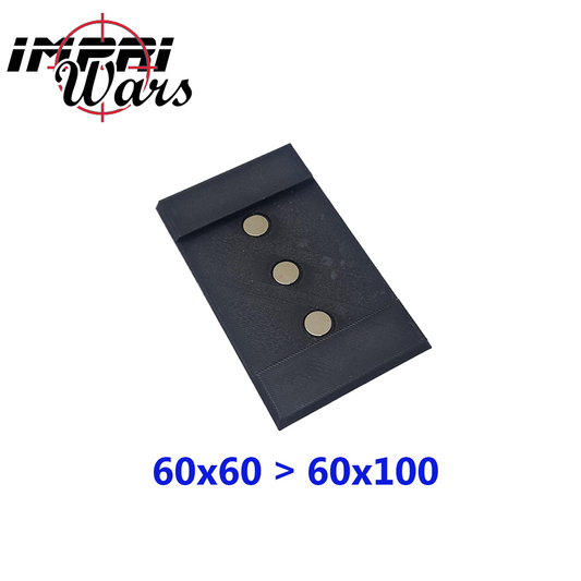 Adaptador negro rectangular con tres imanes redondos en una fila.
