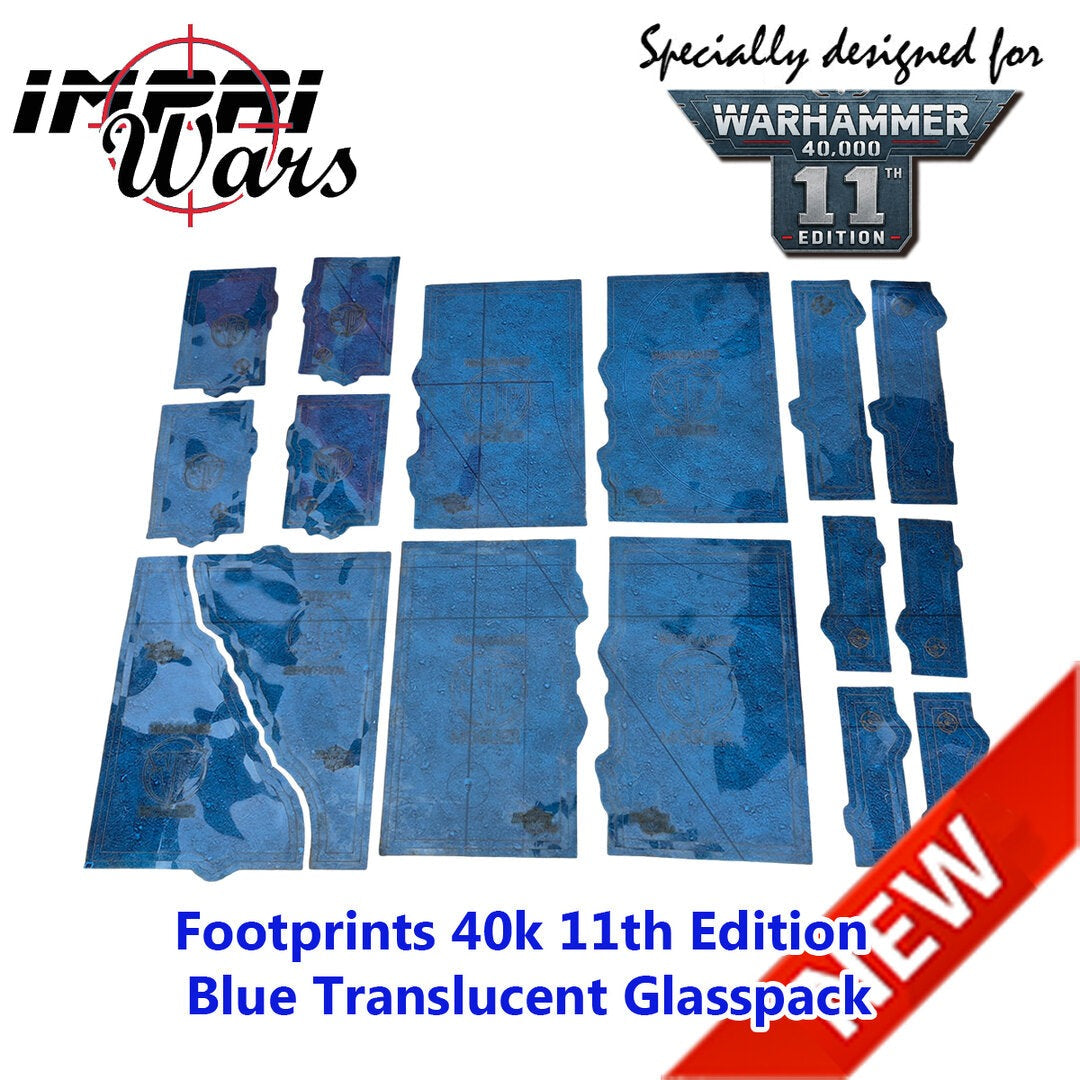 Plantillas azules translúcidas para marcar la escenografía en una mesa de Warhammer 40.000.